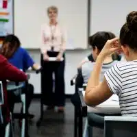 Students doing the exam in classroom