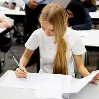 Students doing the exam in classroom